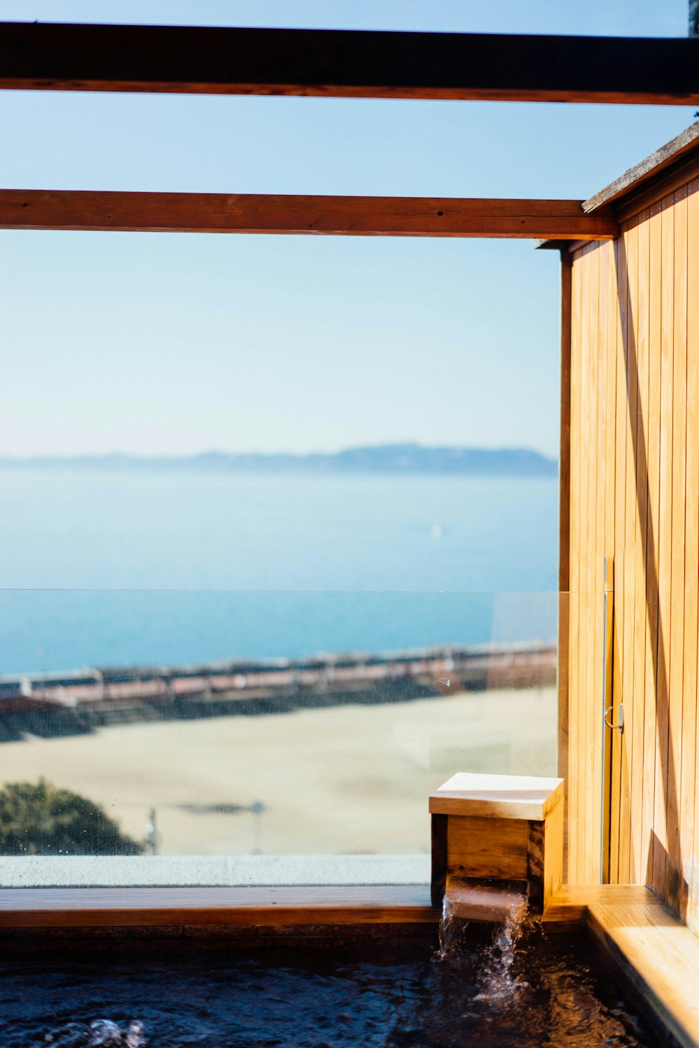 a hot tub with a view of the ocean