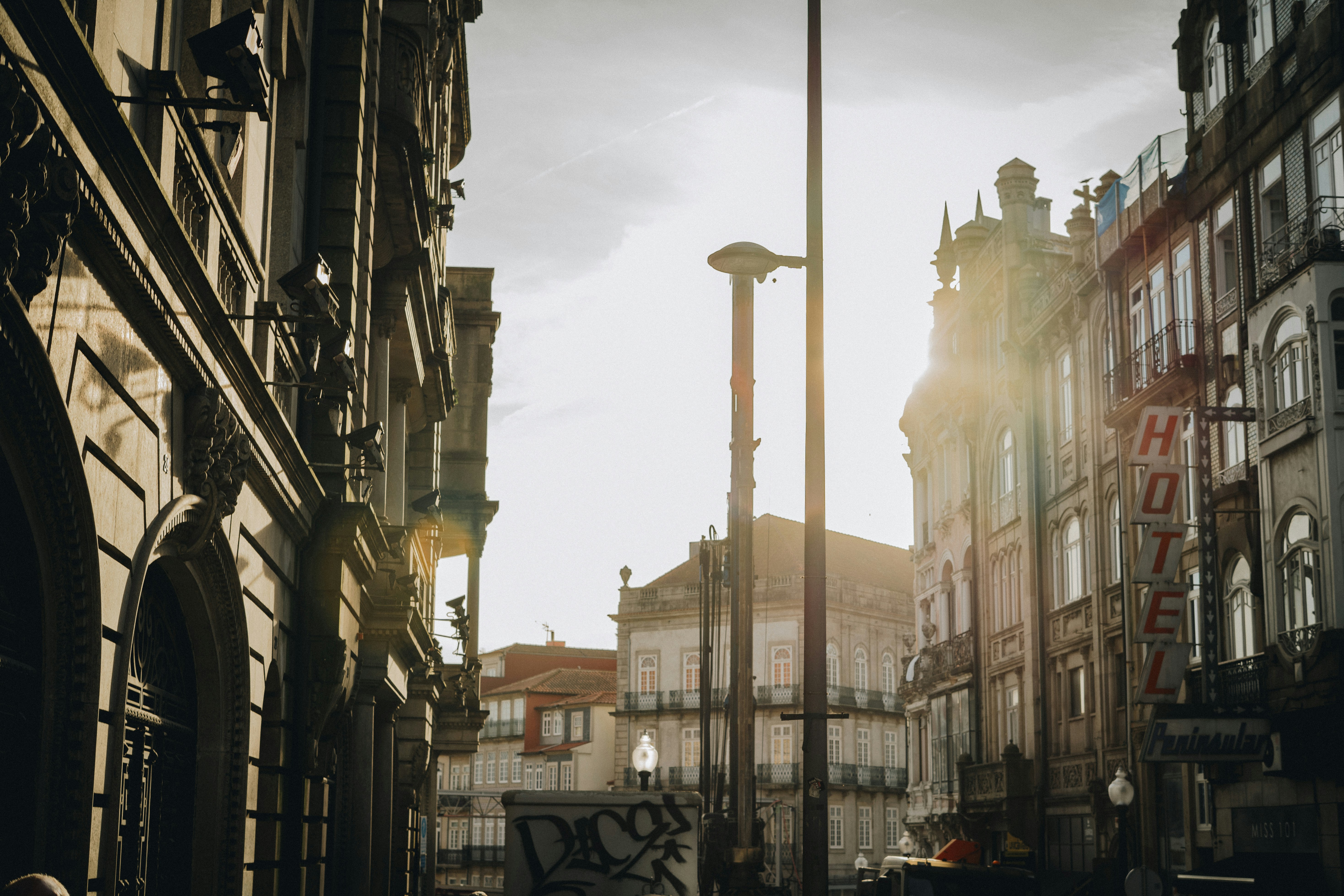 a city street filled with lots of tall buildings