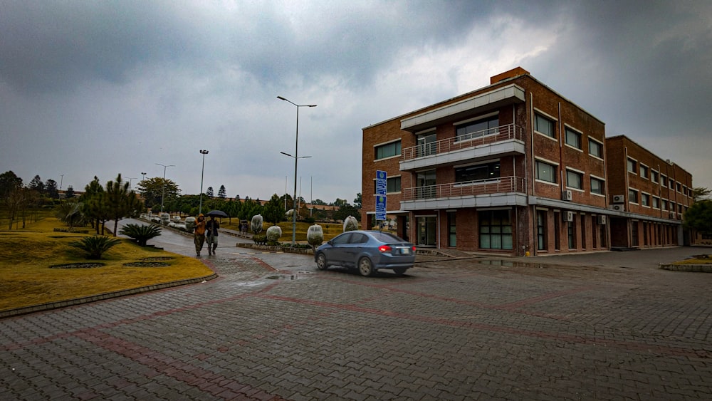 a car is parked in front of a building