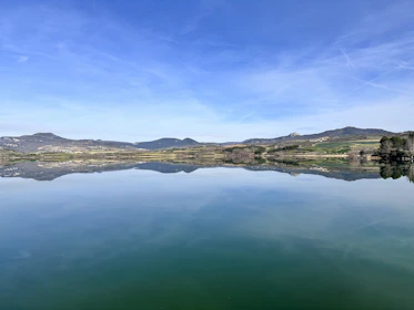 a large body of water surrounded by mountains