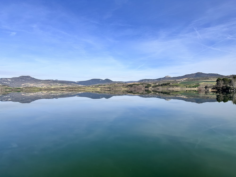 a large body of water surrounded by mountains