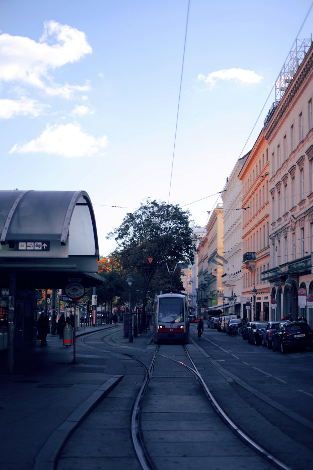 a train on a train track in a city