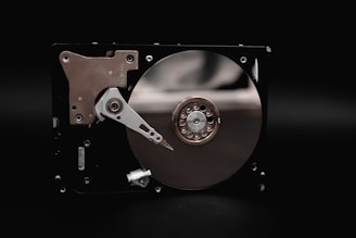 a close up of a hard drive on a black background
