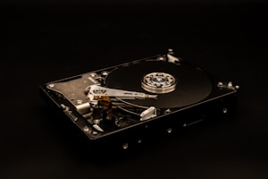 a close up of a hard drive on a black surface