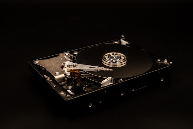 a close up of a hard drive on a black surface