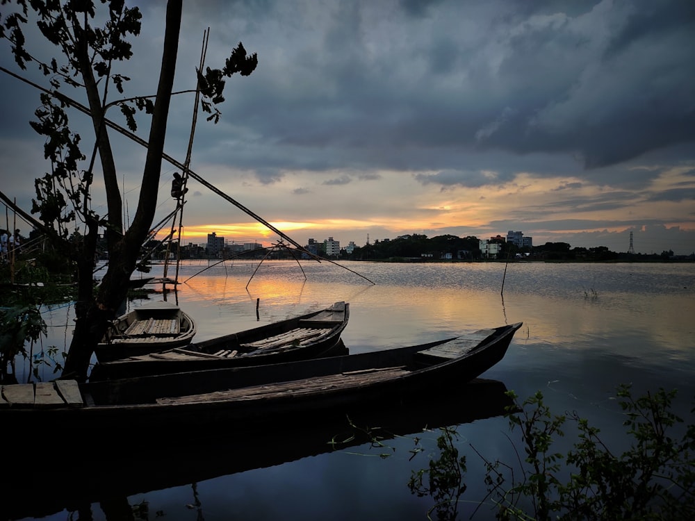 a couple of boats that are sitting in the water