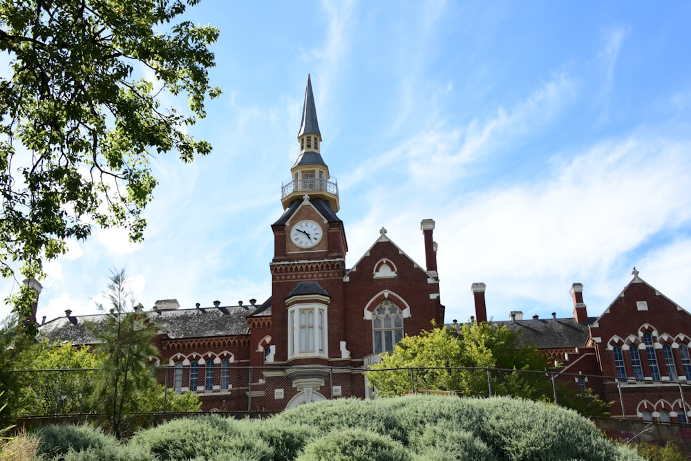 a large building with a clock on the top of it