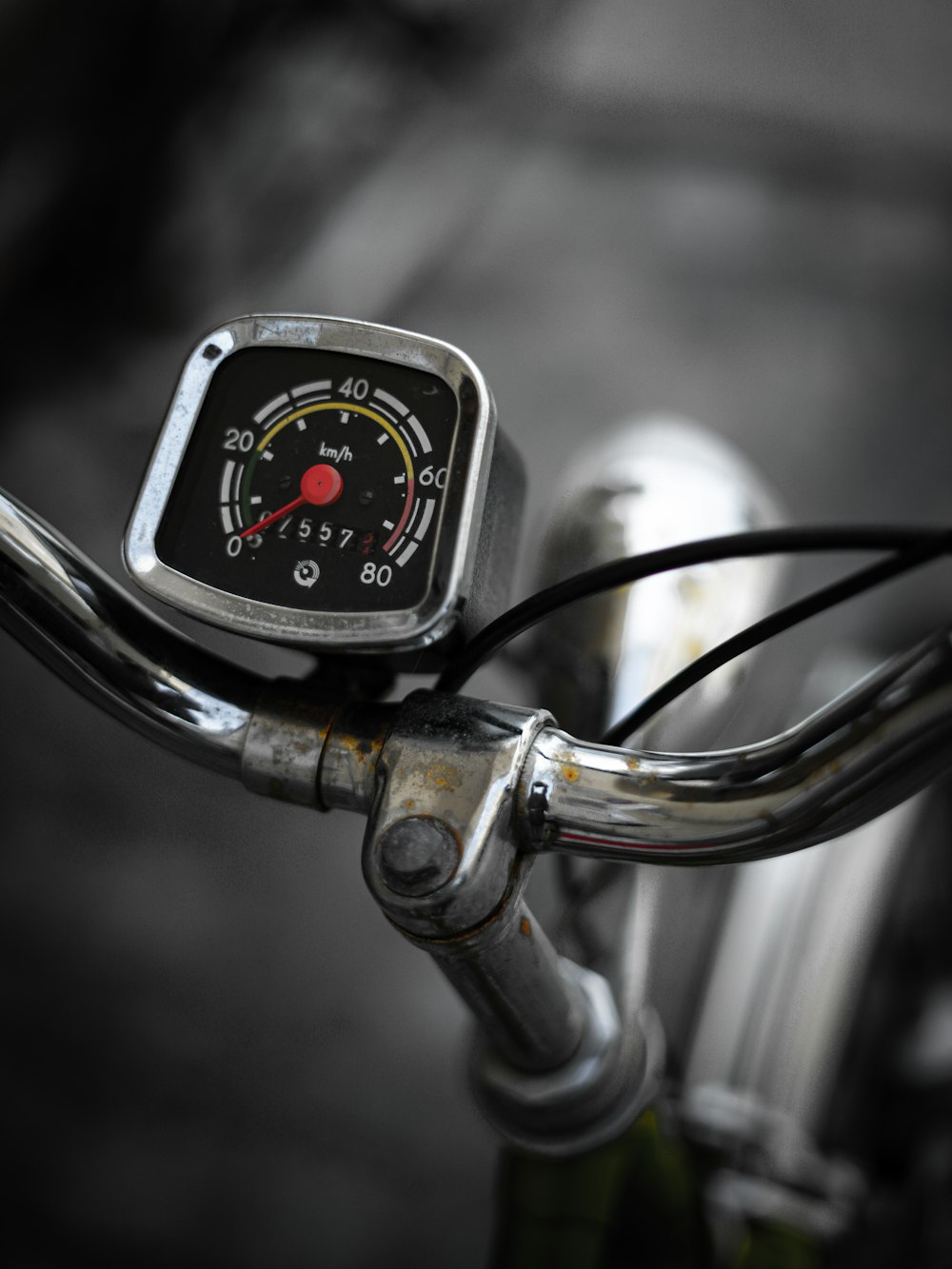 a close up of a speedometer on a bike