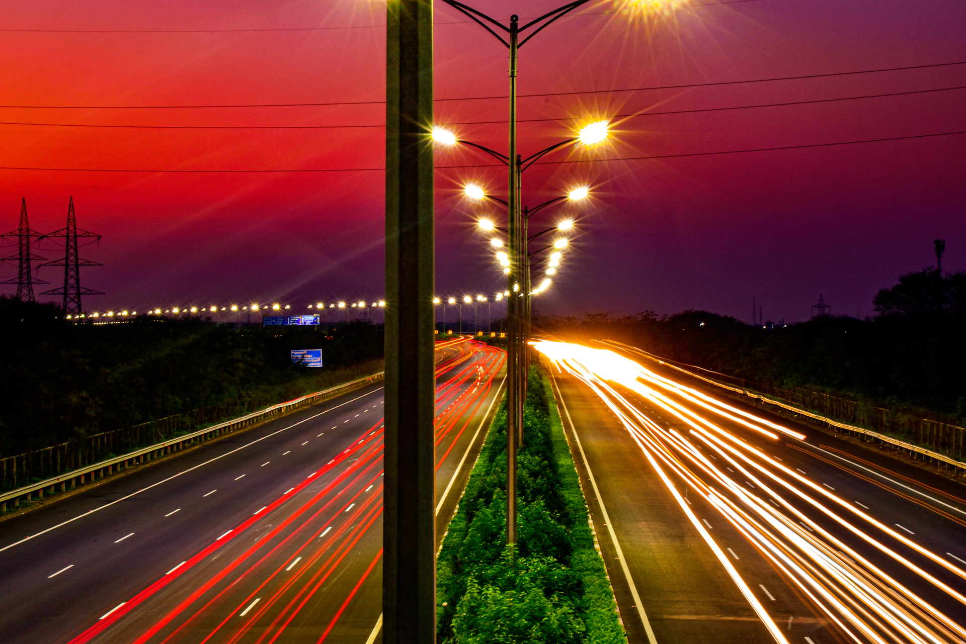 a city street at night with street lights