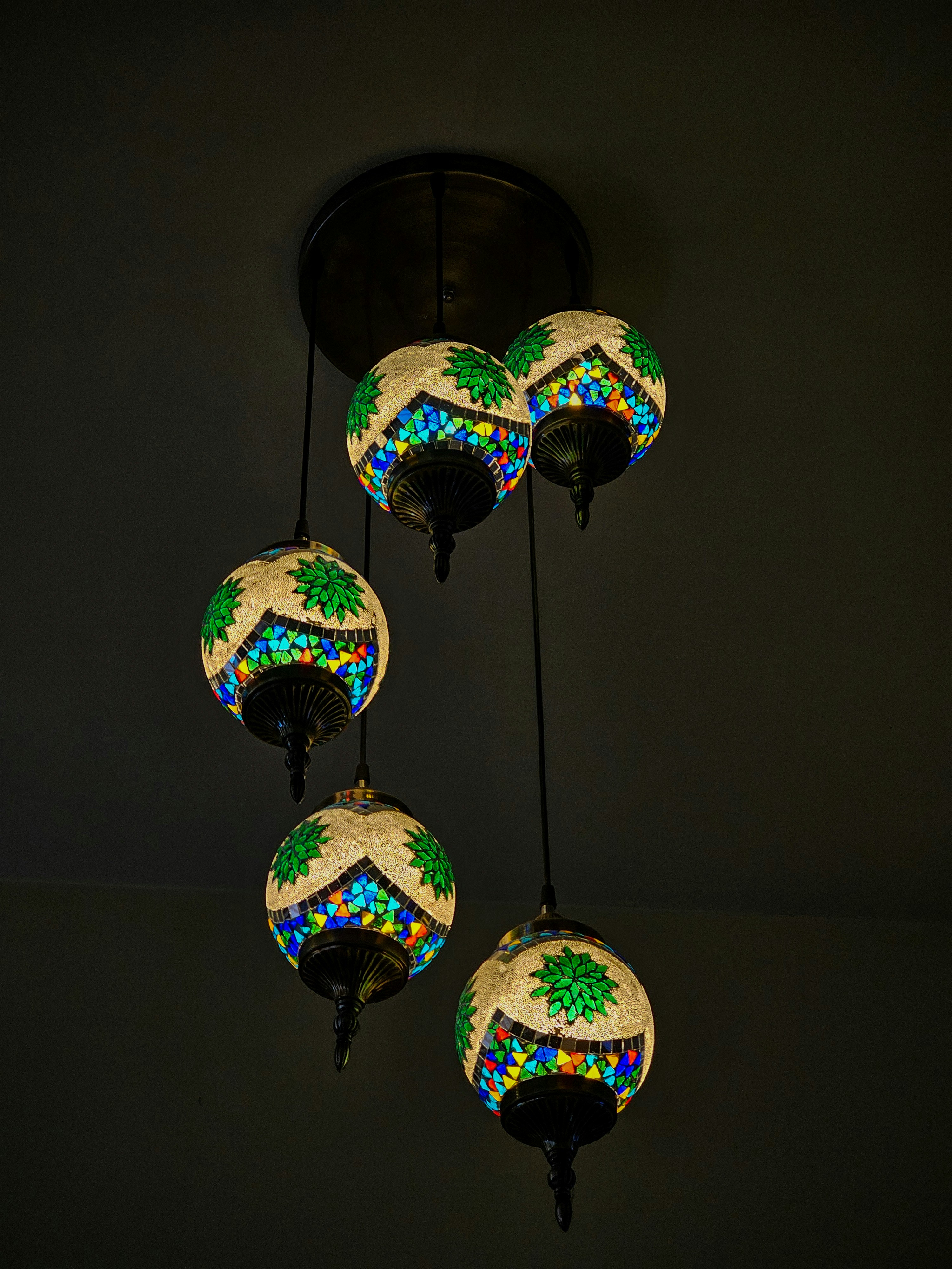 a group of lights hanging from a ceiling