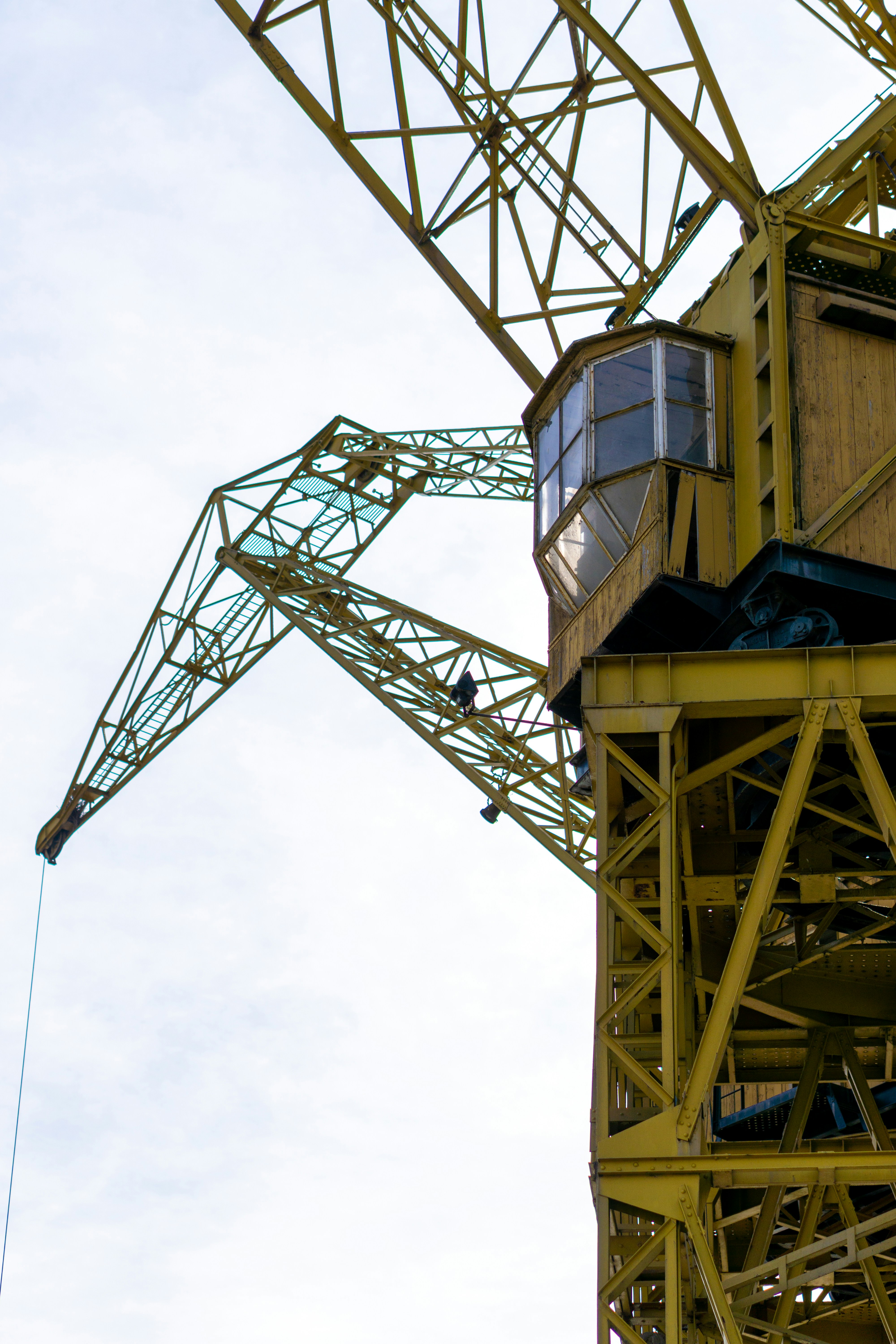 a large crane is attached to the side of a building
