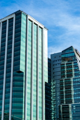a tall building with a clock on the top of it