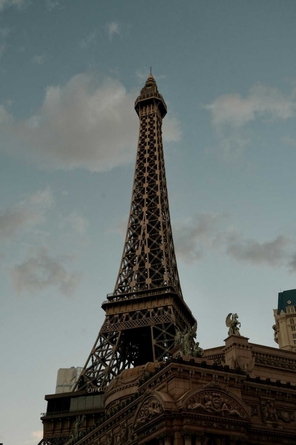 the eiffel tower towering over the city of paris