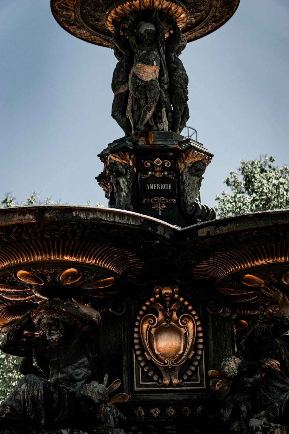 a fountain with a statue on top of it