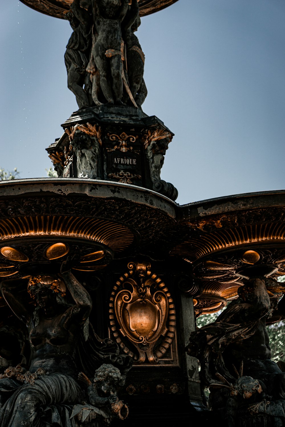 a fountain with a statue on top of it