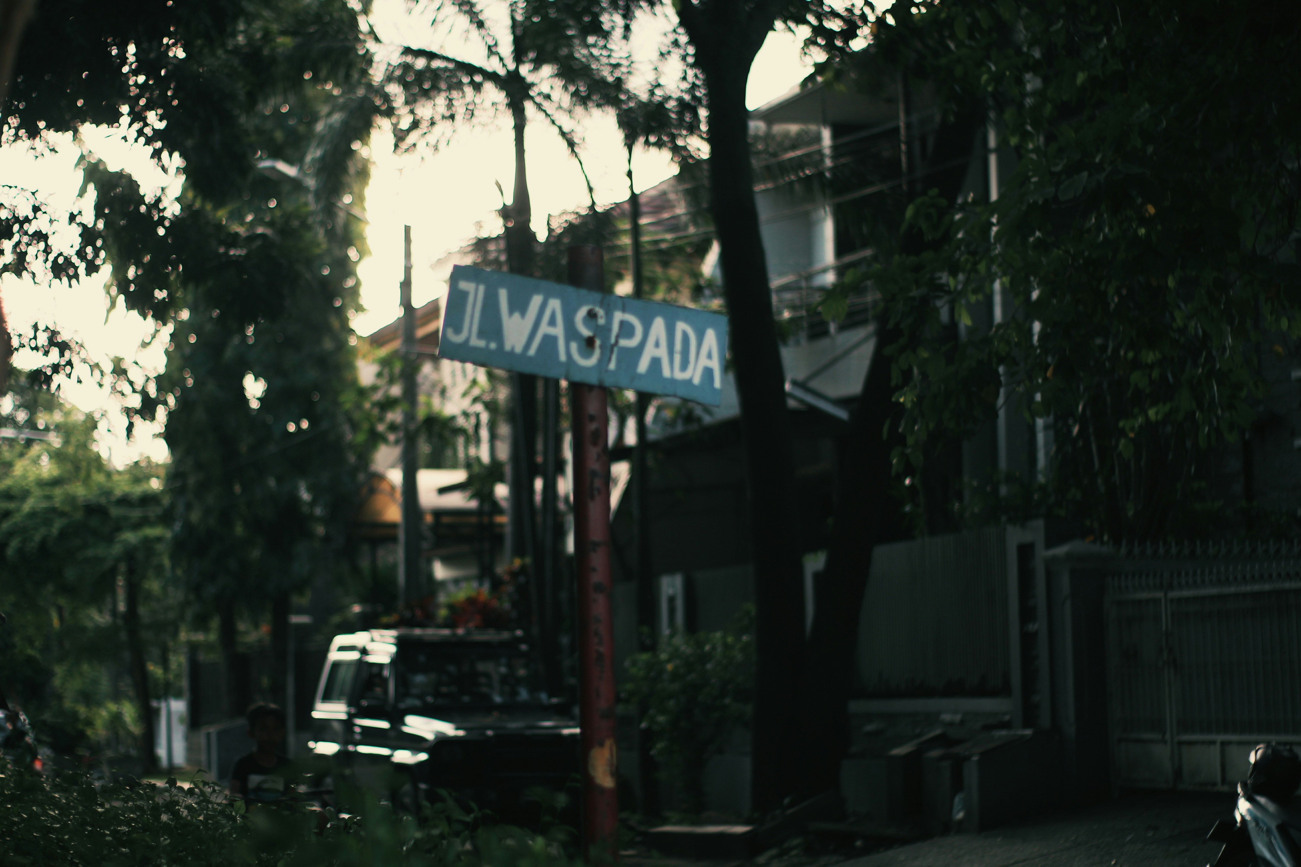a street sign on the side of a road