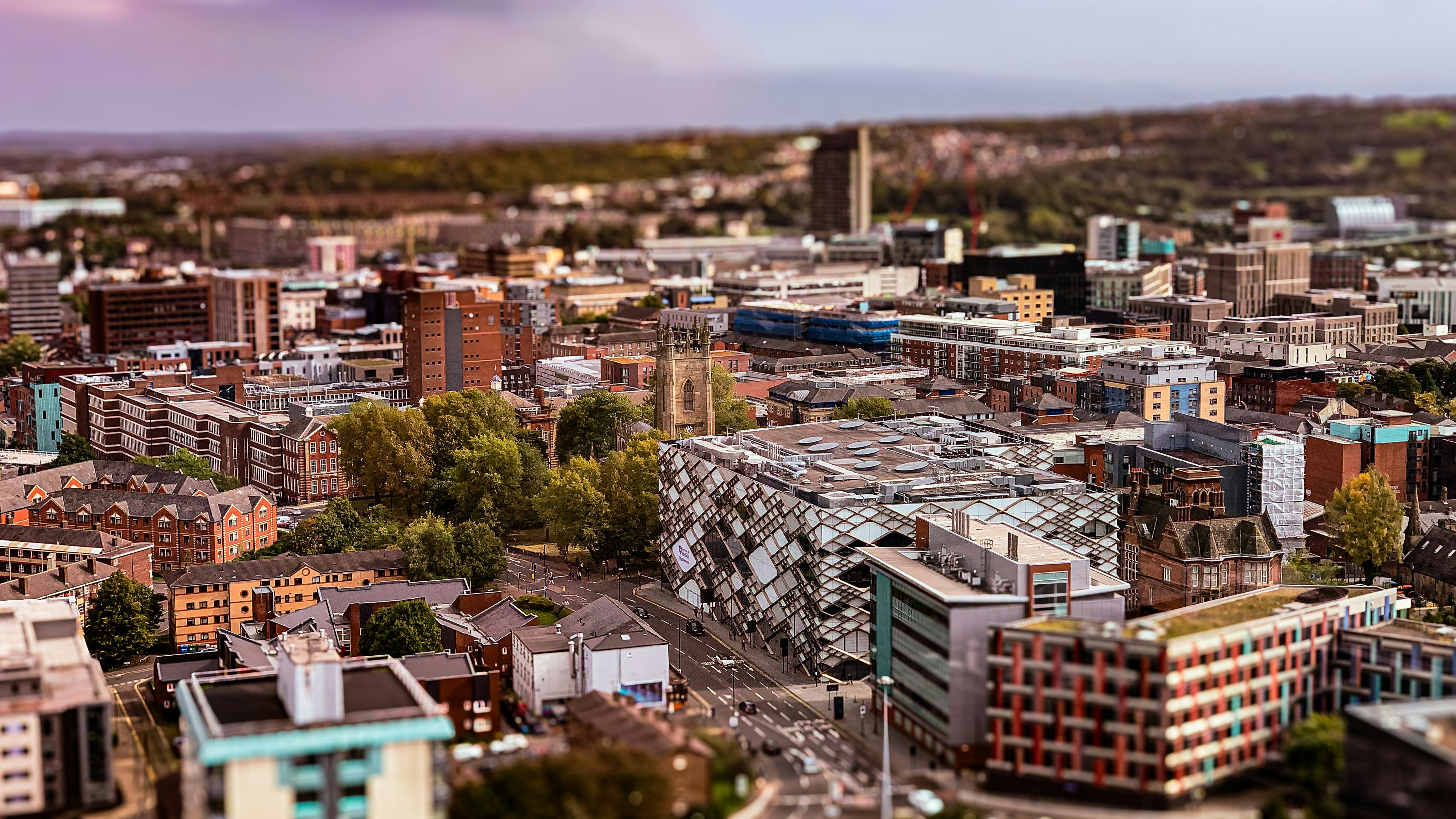 an aerial view of a city with tall buildings