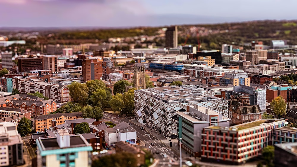 an aerial view of a city with tall buildings