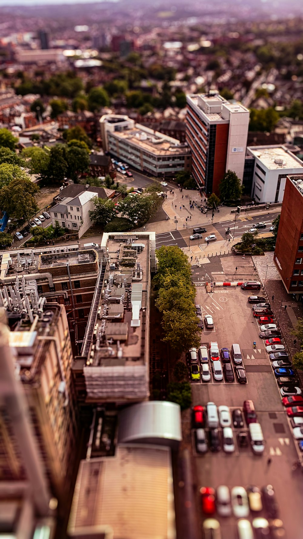 an aerial view of a city with tall buildings