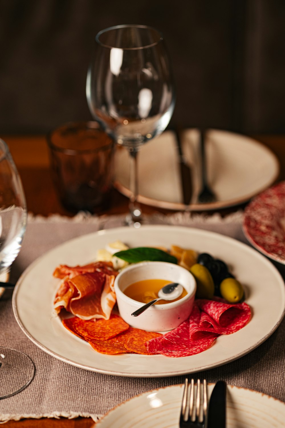 a white plate topped with meat and vegetables