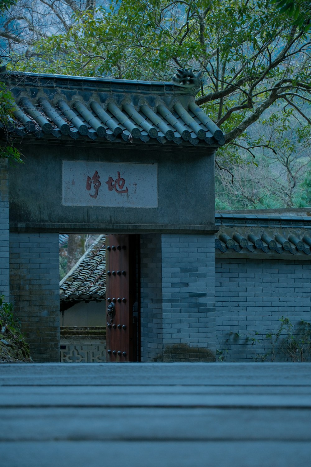 a building with a red door in front of it