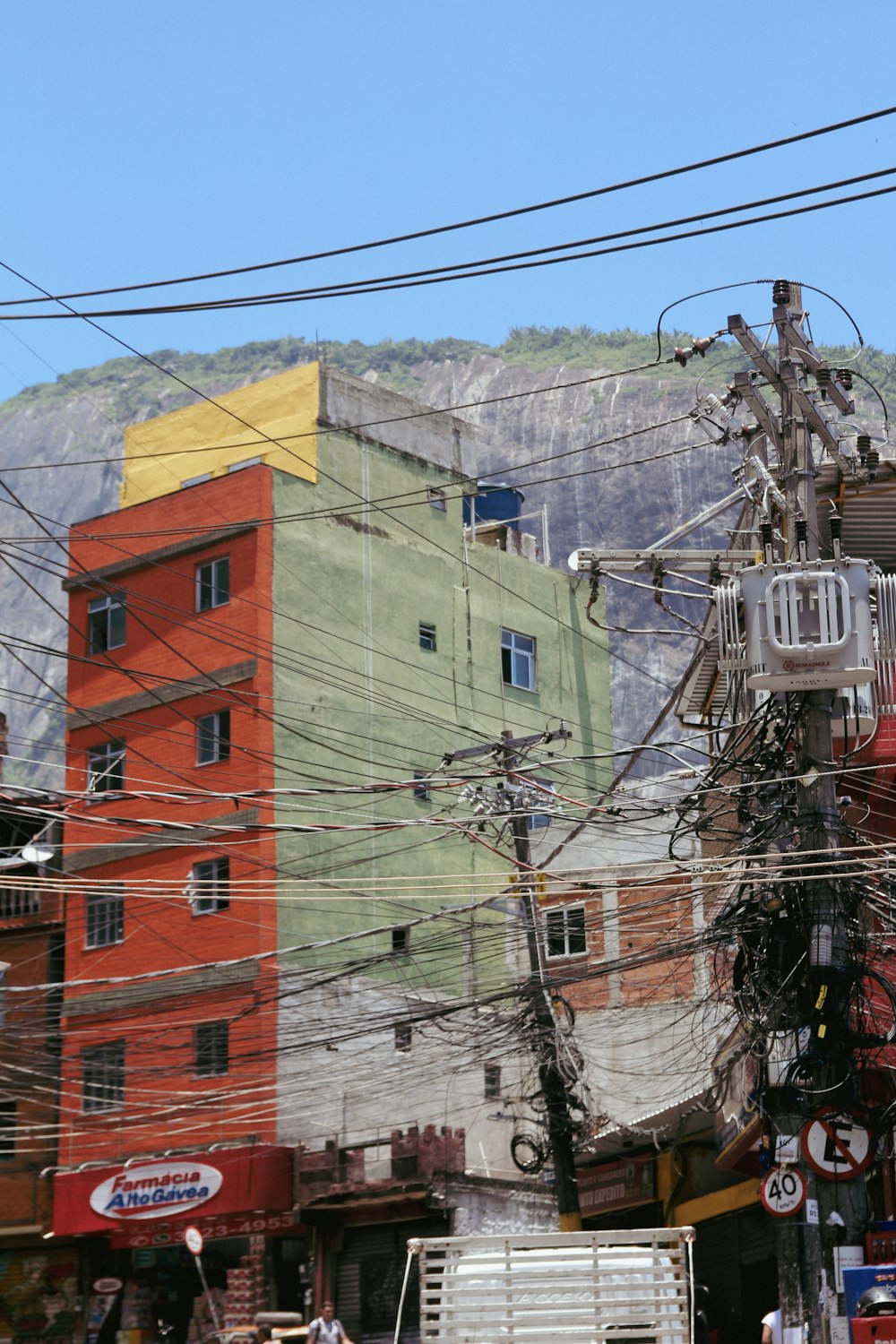 a city street filled with lots of power lines