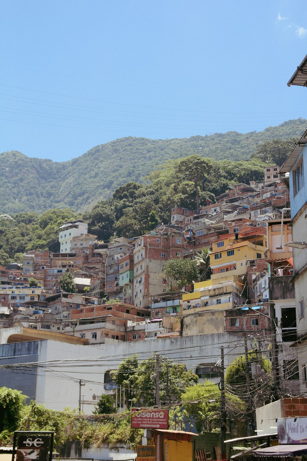 a view of a city with mountains in the background