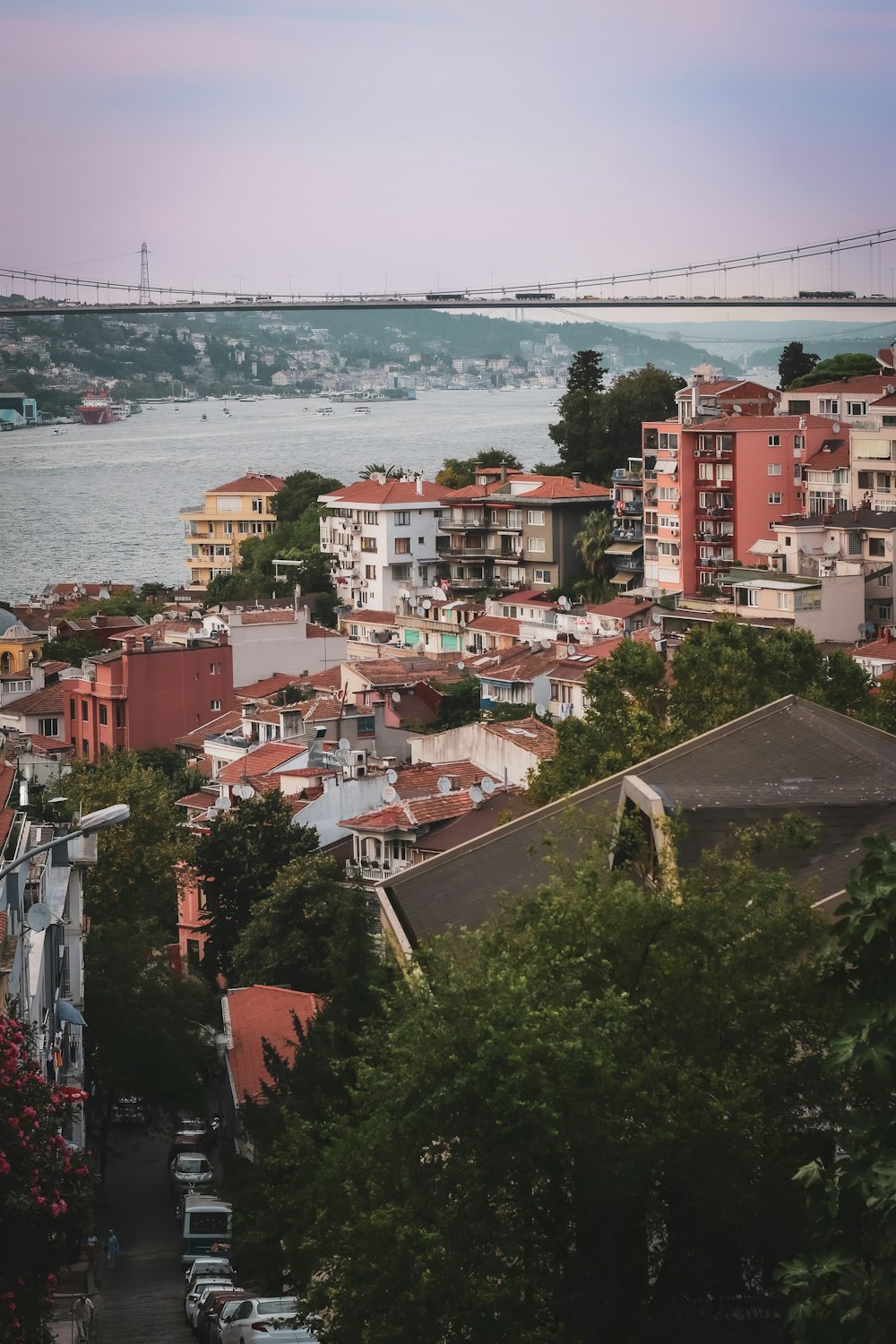 a view of a city with a bridge in the background