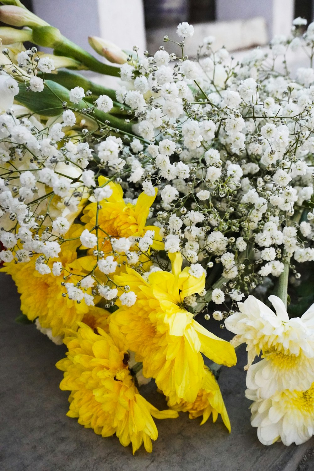 a bunch of flowers that are sitting on a table