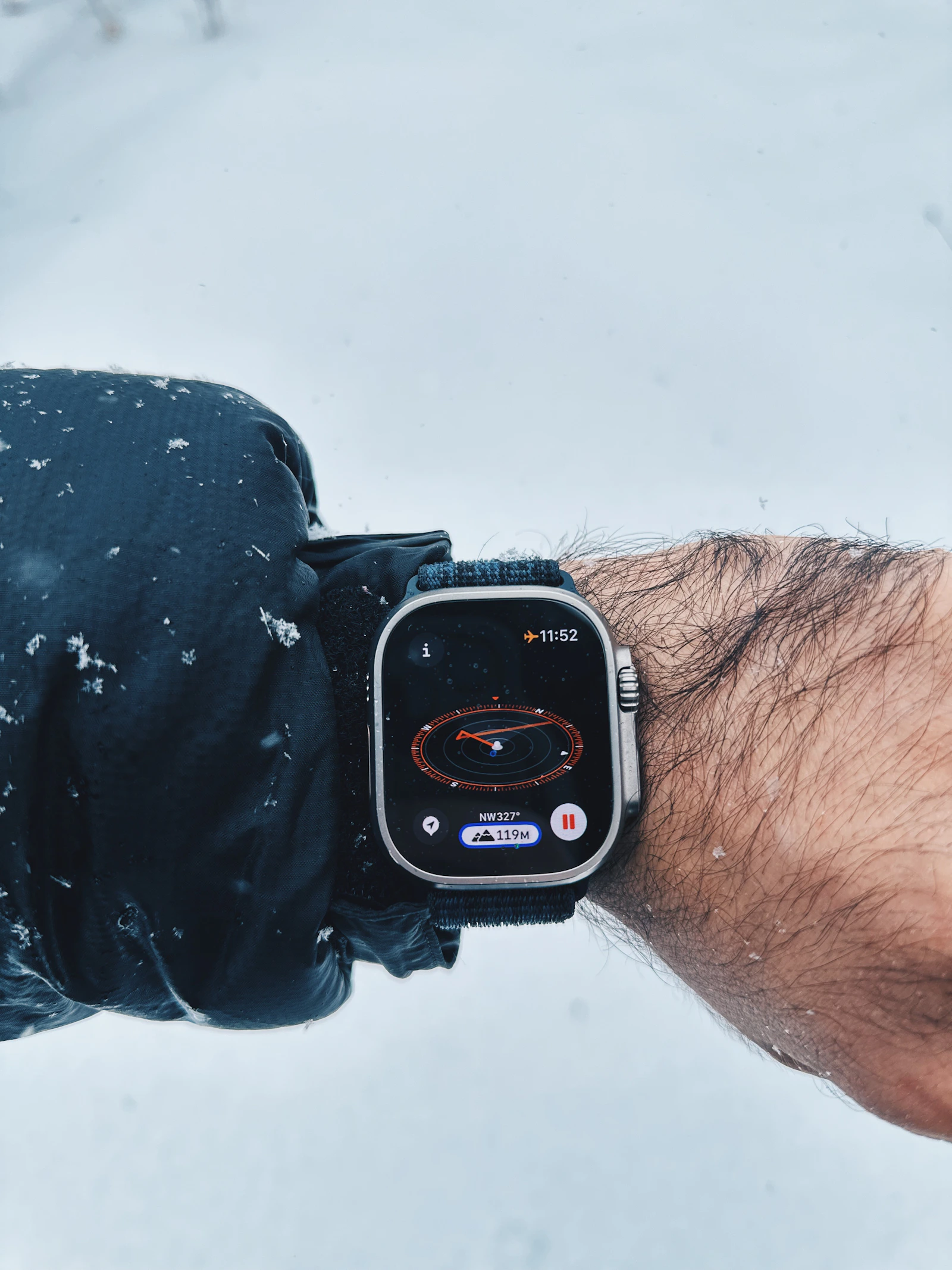 Apple Watch Ultra on wrist in snow