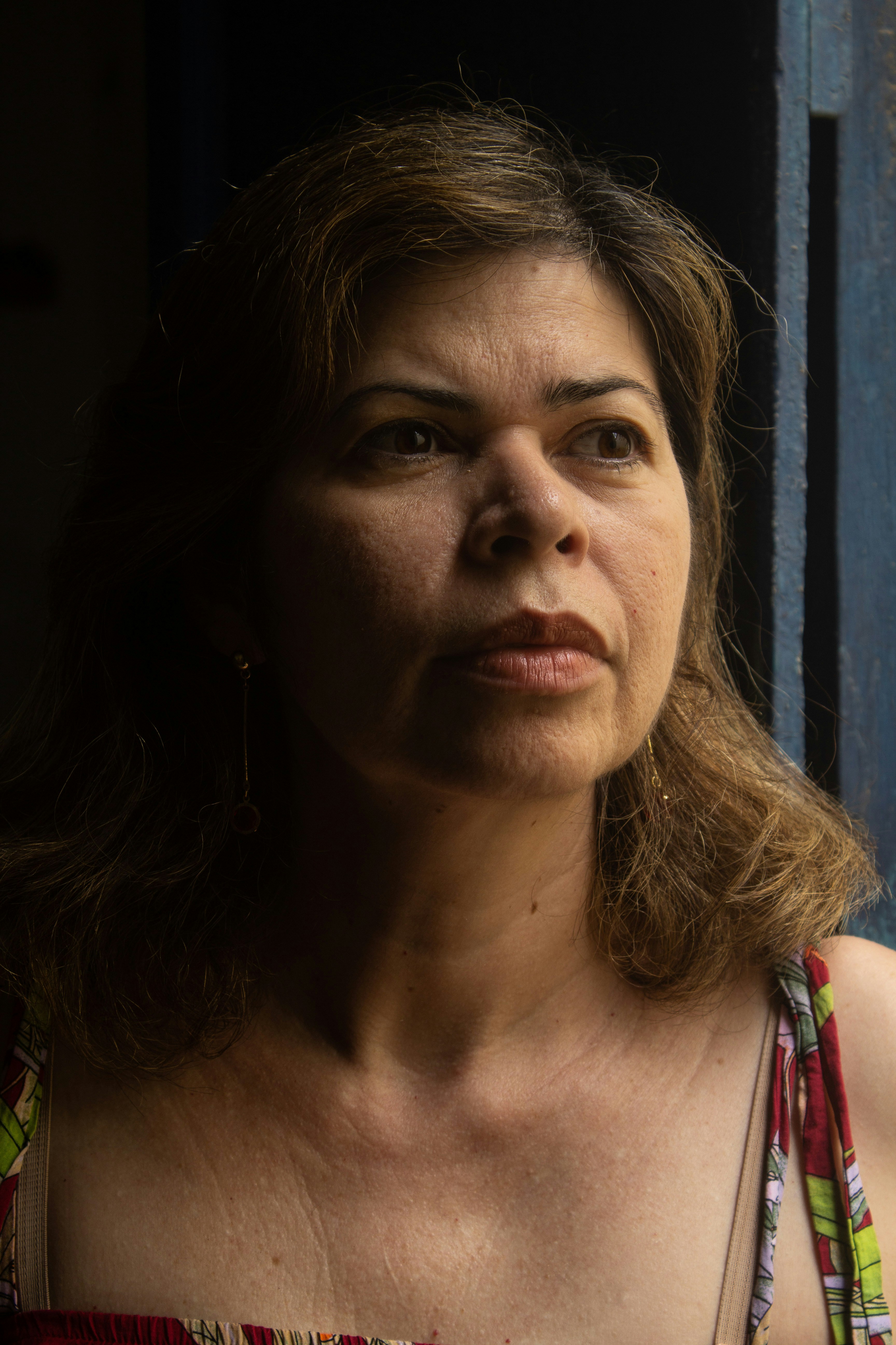 a close up of a person wearing a dress