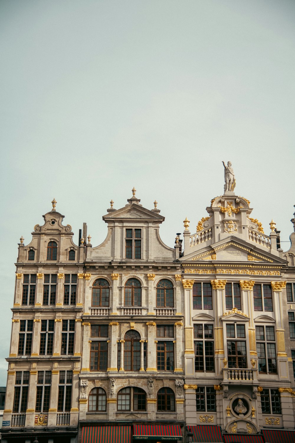 a large building with a clock on the front of it