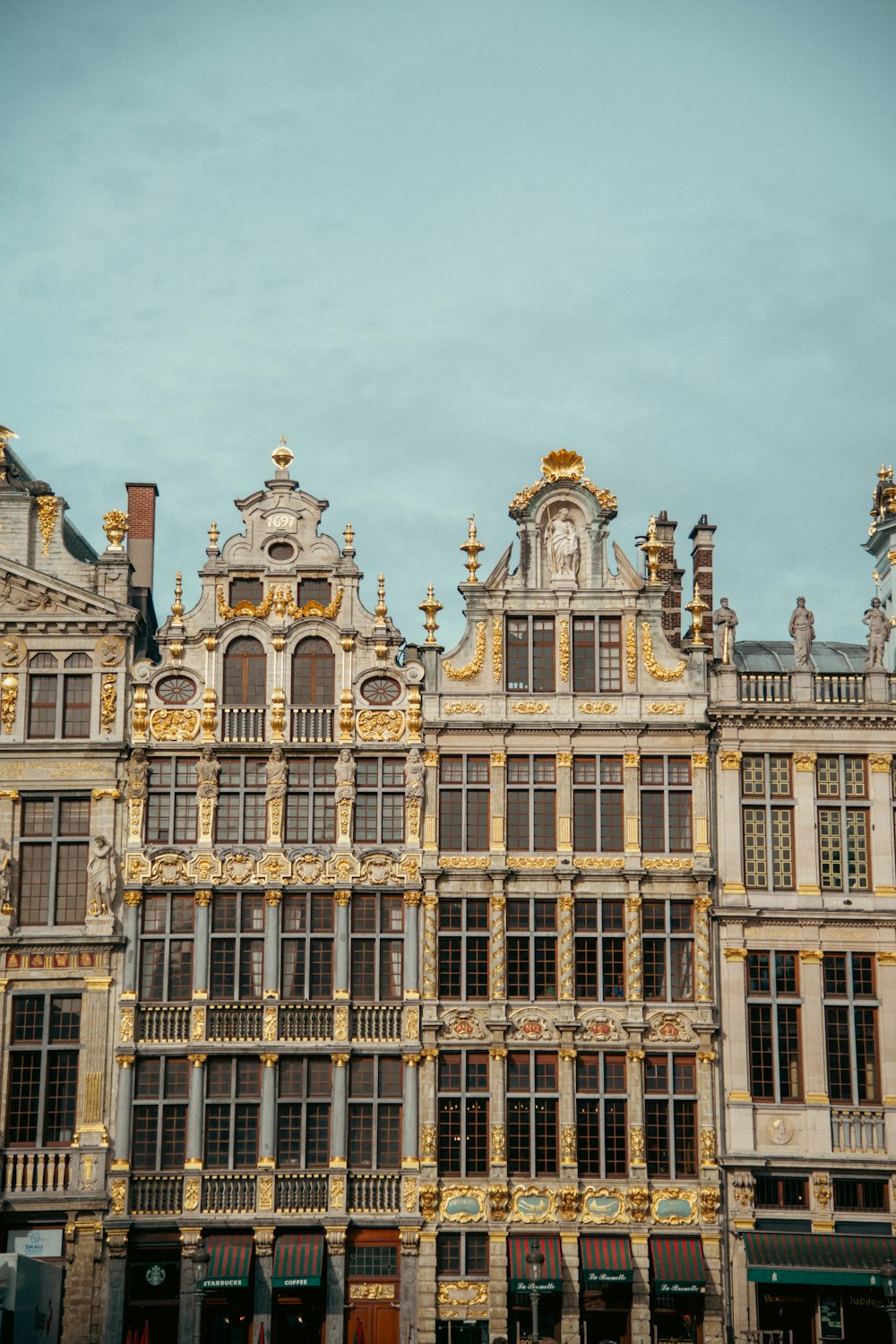 a large building with a clock on the front of it