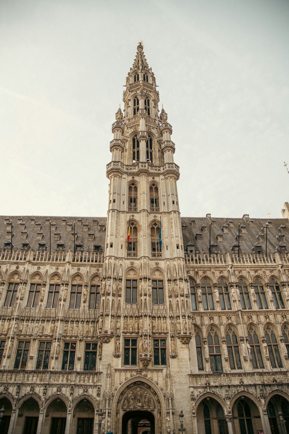 a very tall building with a clock on it's side