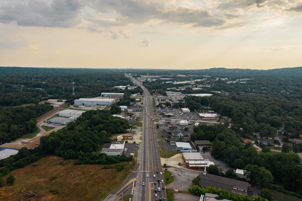 an aerial view of a city with a highway