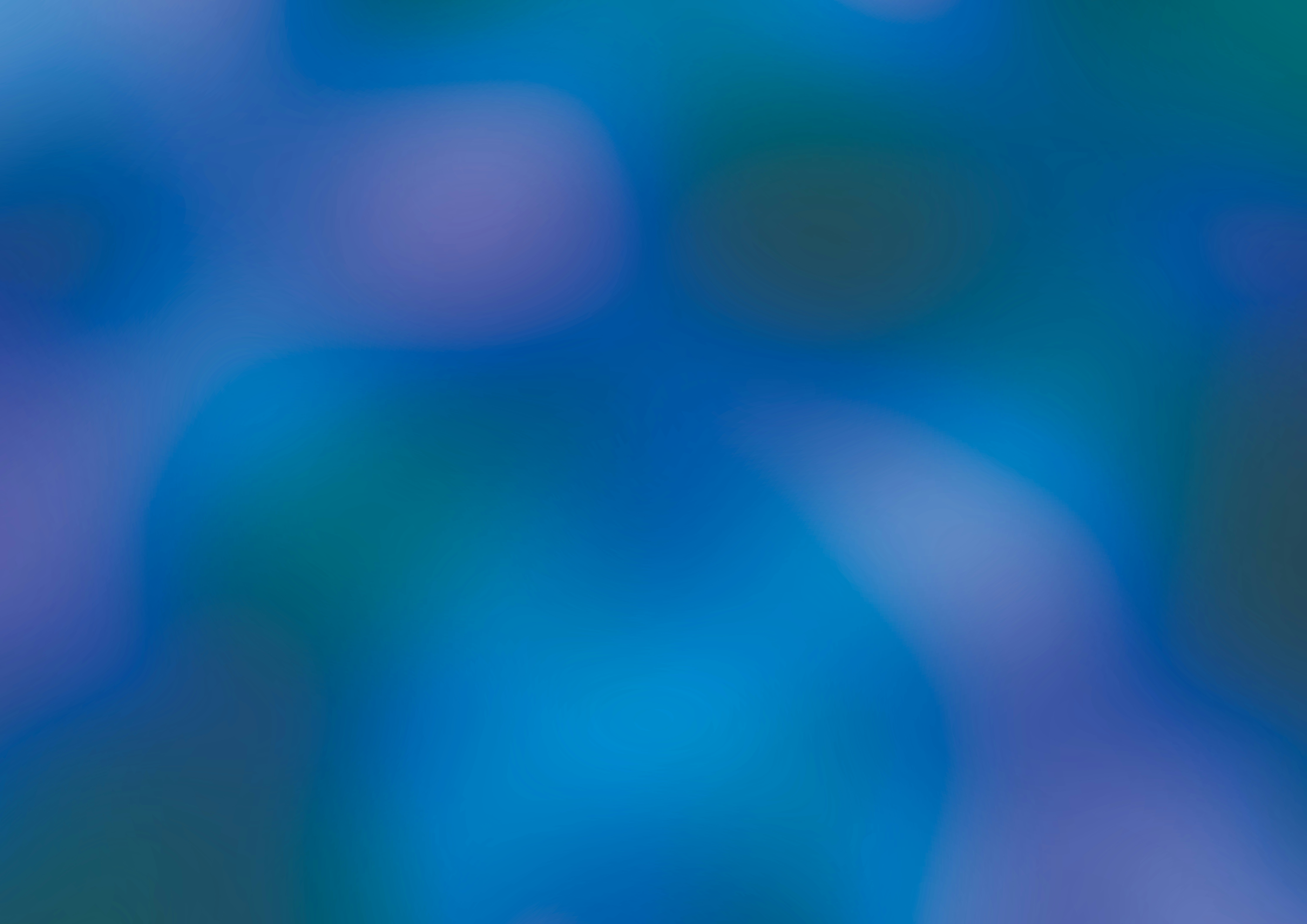 a blurry image of a blue and green background