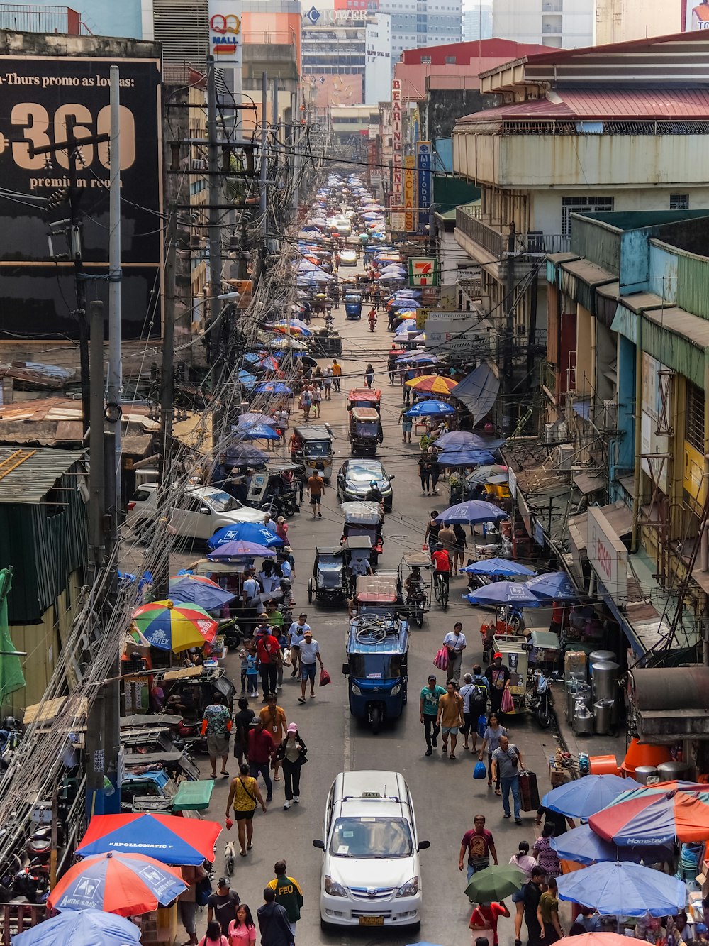 a busy city street filled with lots of people