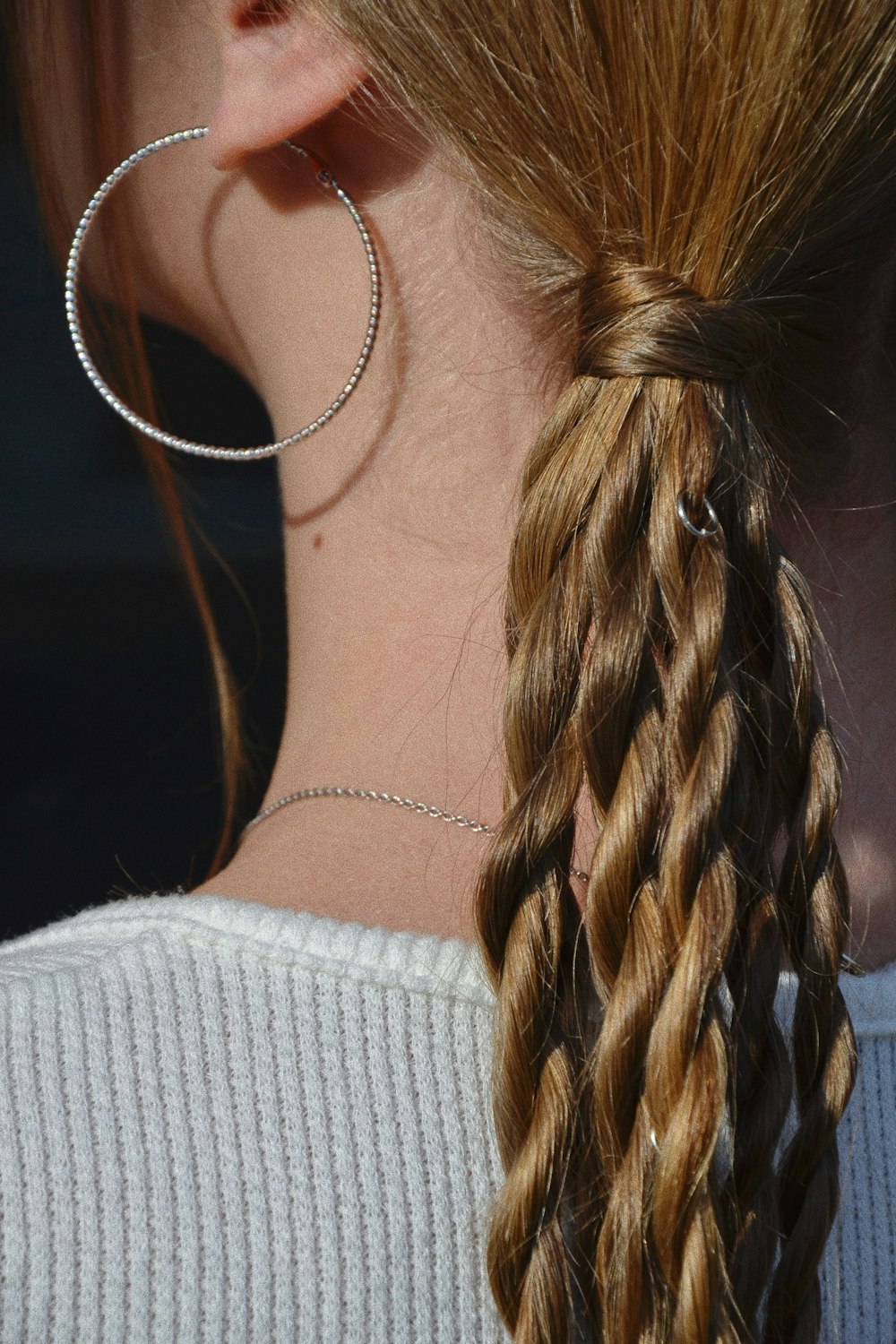 a close up of a person with long hair