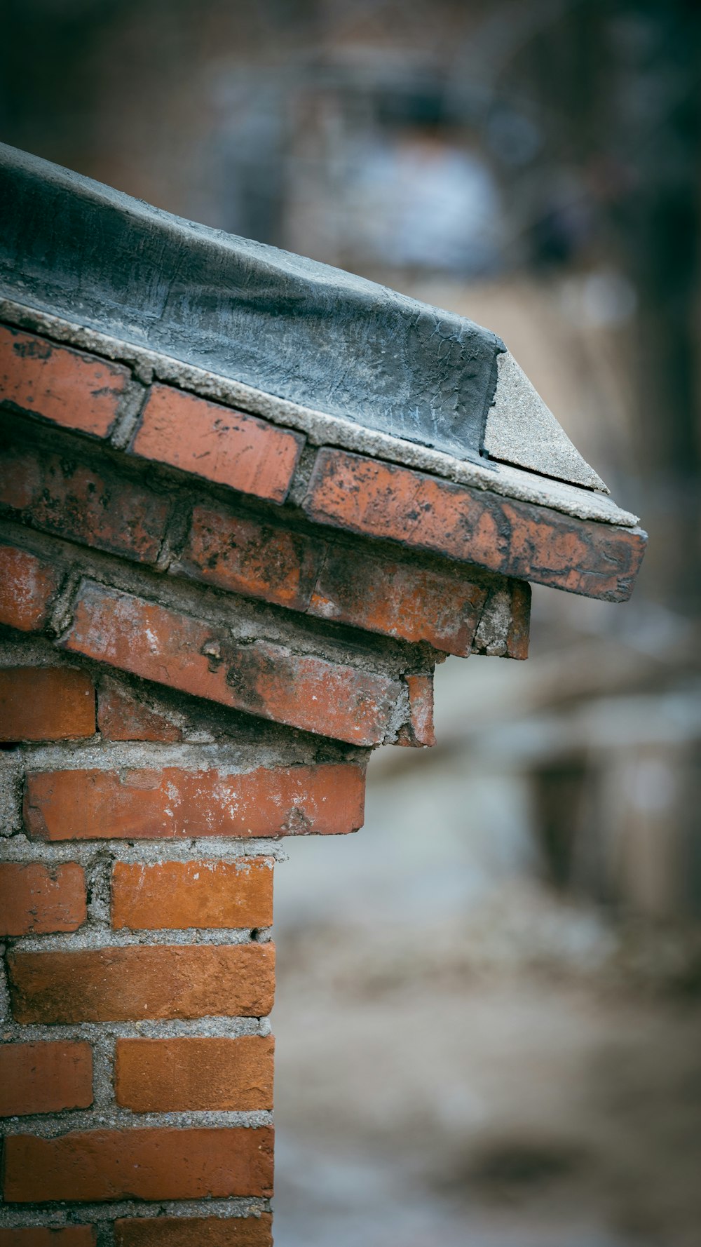 a close up of a brick chimney on a building