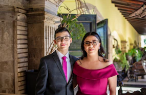 a man and a woman standing next to each other