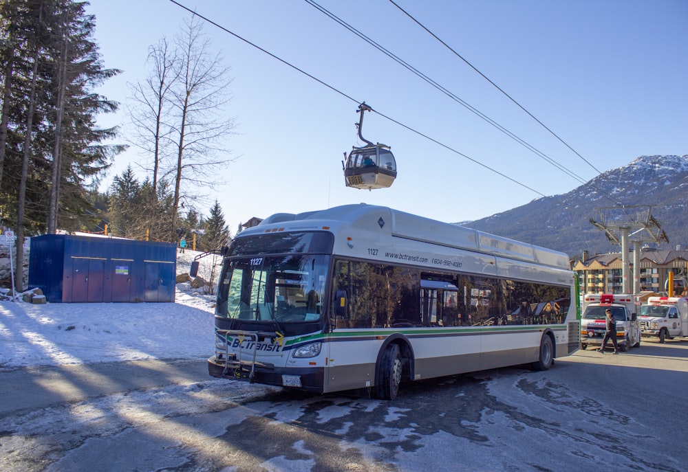 a public transit bus on a snowy road