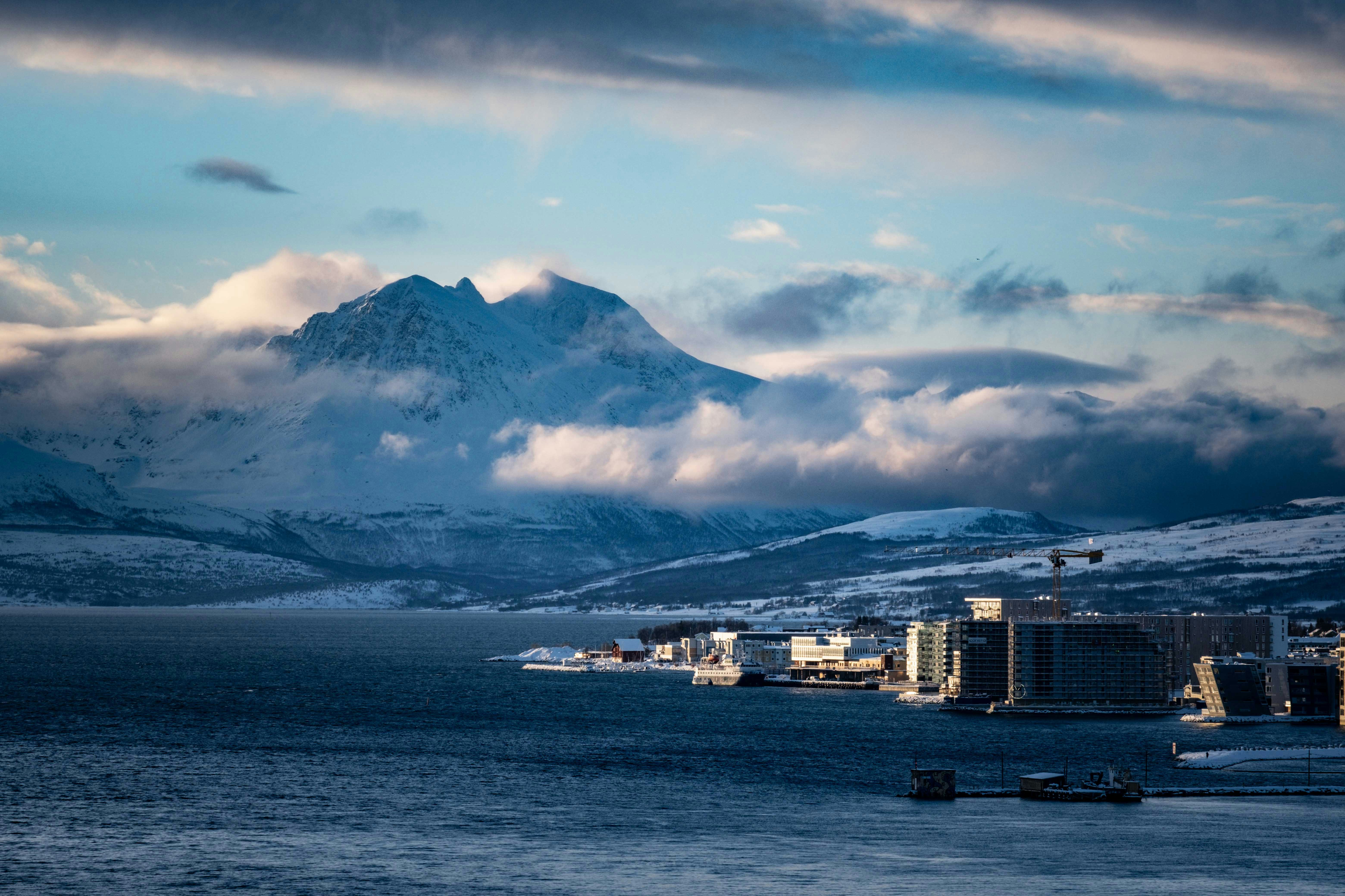 a view of a city with a mountain in the background