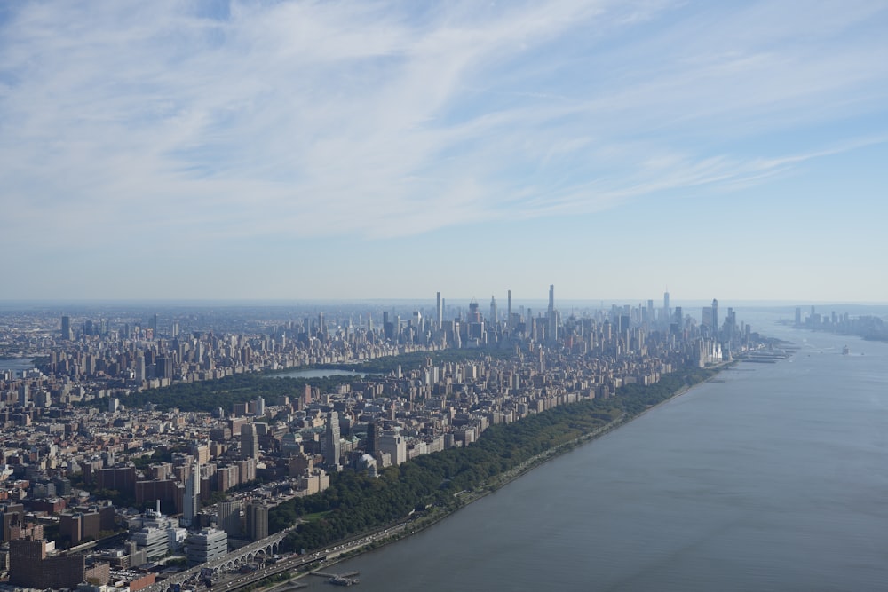 an aerial view of a city and a river