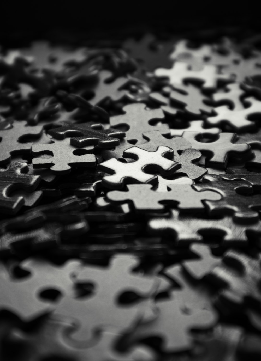 a black and white photo of a puzzle