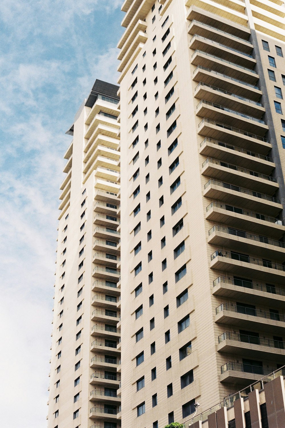 a tall building with a clock on the top of it