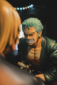 a statue of a man with green hair