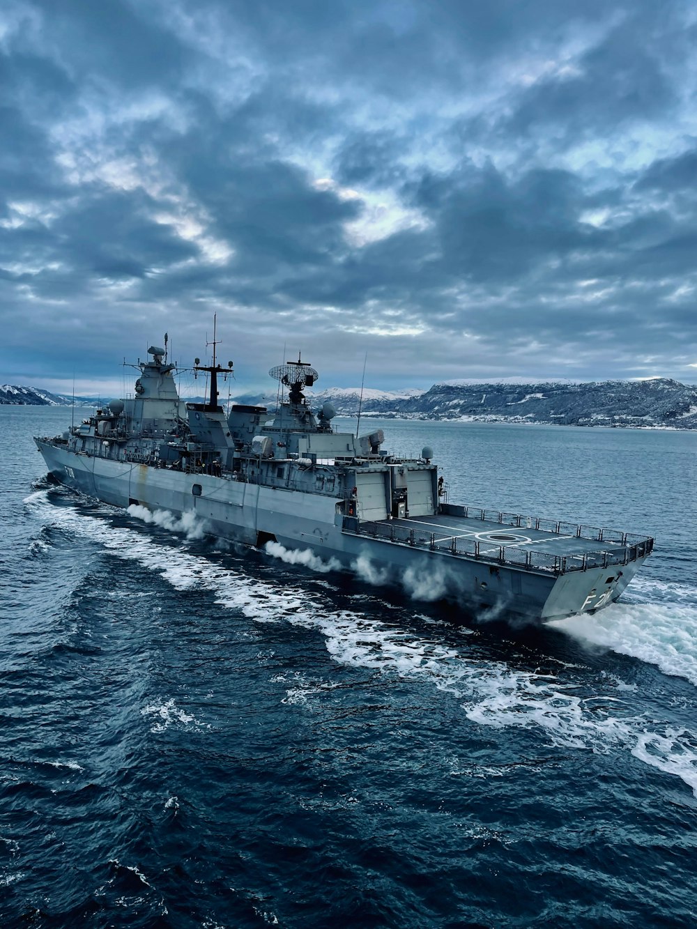 a large military ship in the middle of the ocean