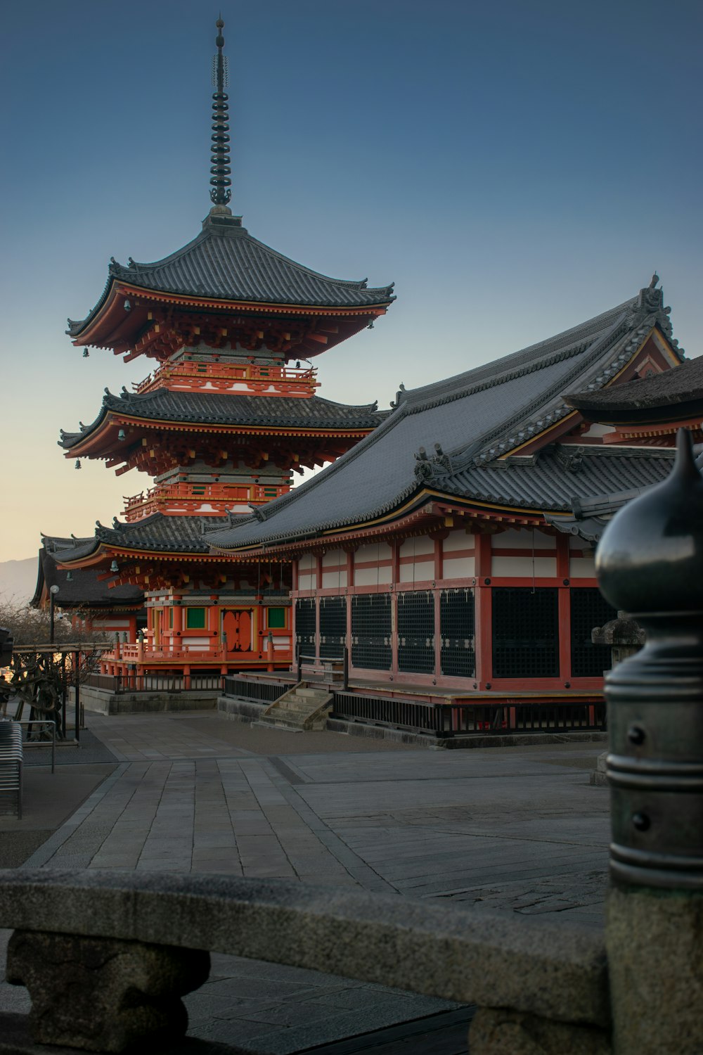 a tall building with a tower in the background