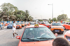 a busy street filled with lots of cars and people