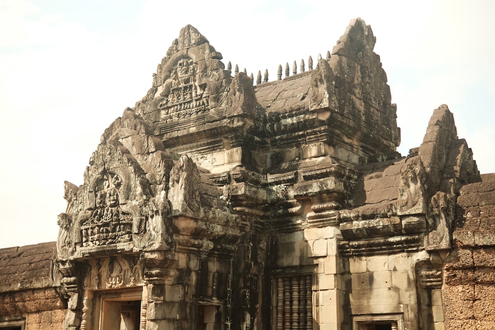 a very old building with a lot of carvings on it